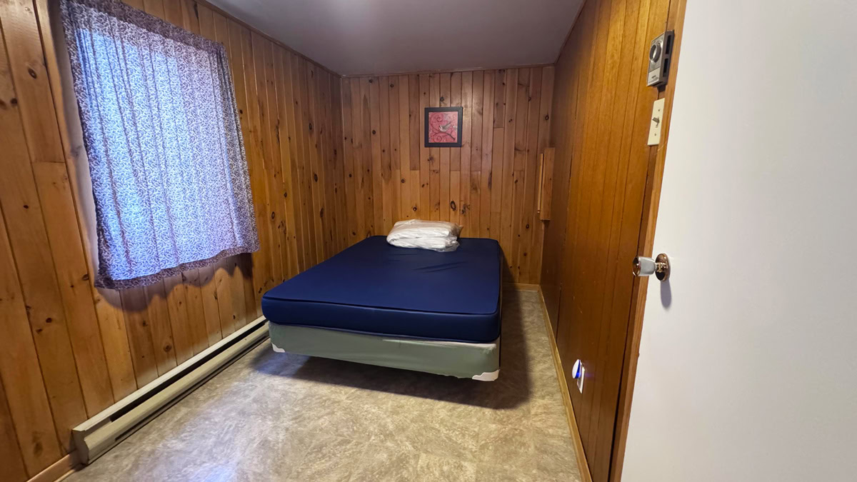 La chambre de maitre chalet Bouchette #5, avec un lit double